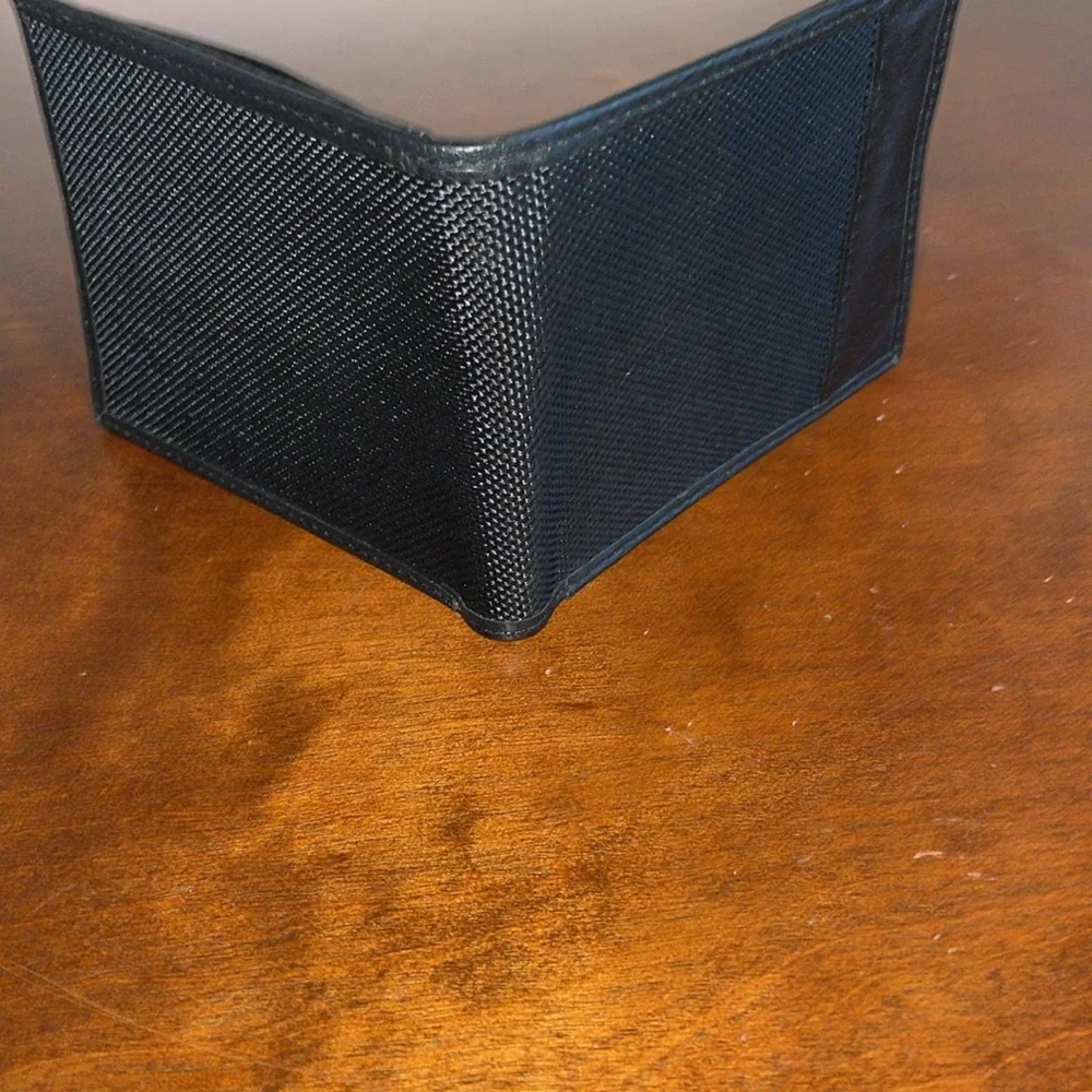 Travelon Genuine Leather Men’s Black Rugged Fold Wallet